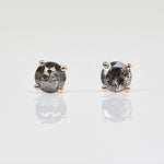 Dark and stormy salt and pepper diamond studs set in 18ct rose gold