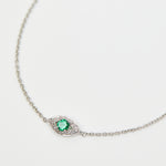 Green sapphire evil eye bracelet with diamonds in 18ct white gold.