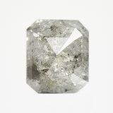 Modern emerald-shaped rose-cut grey salt and pepper diamond with speckled inclusions.