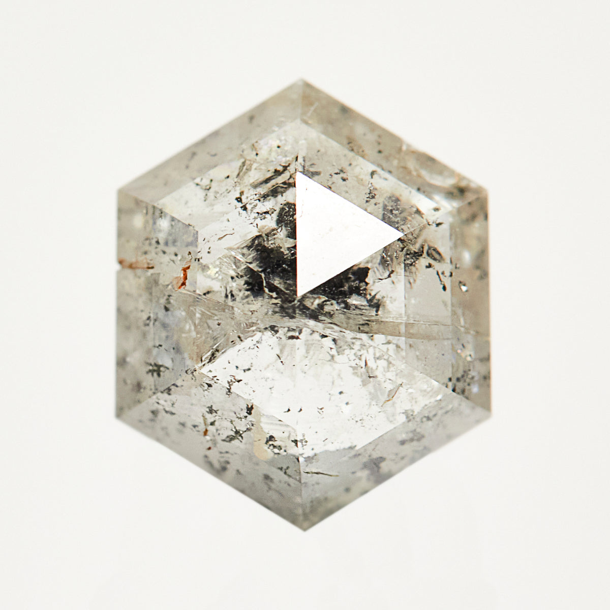 Alternative hexagon rose-cut grey raw salt and pepper diamond.