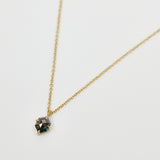 Hexagon black salt and pepper diamond necklace in 18ct yellow gold.