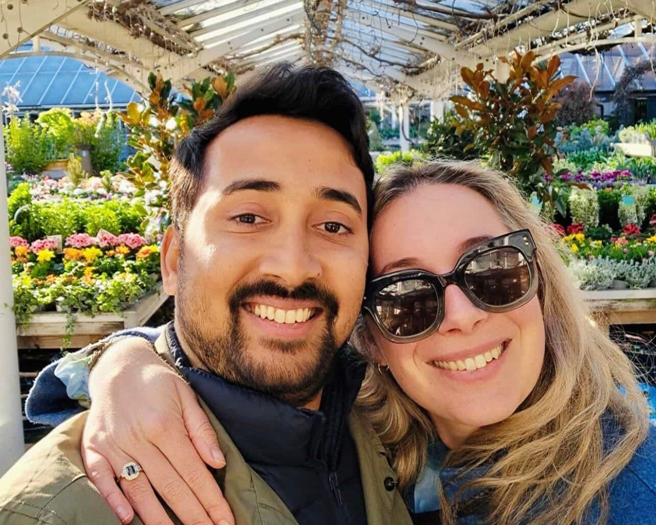 Happy engagement photo with engagement ring
