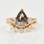 18ct rose gold salt and pepper pear diamond engagement trilogy ring