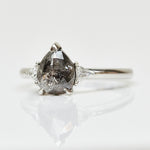 Platinum salt and pepper pear diamond engagement trilogy ring