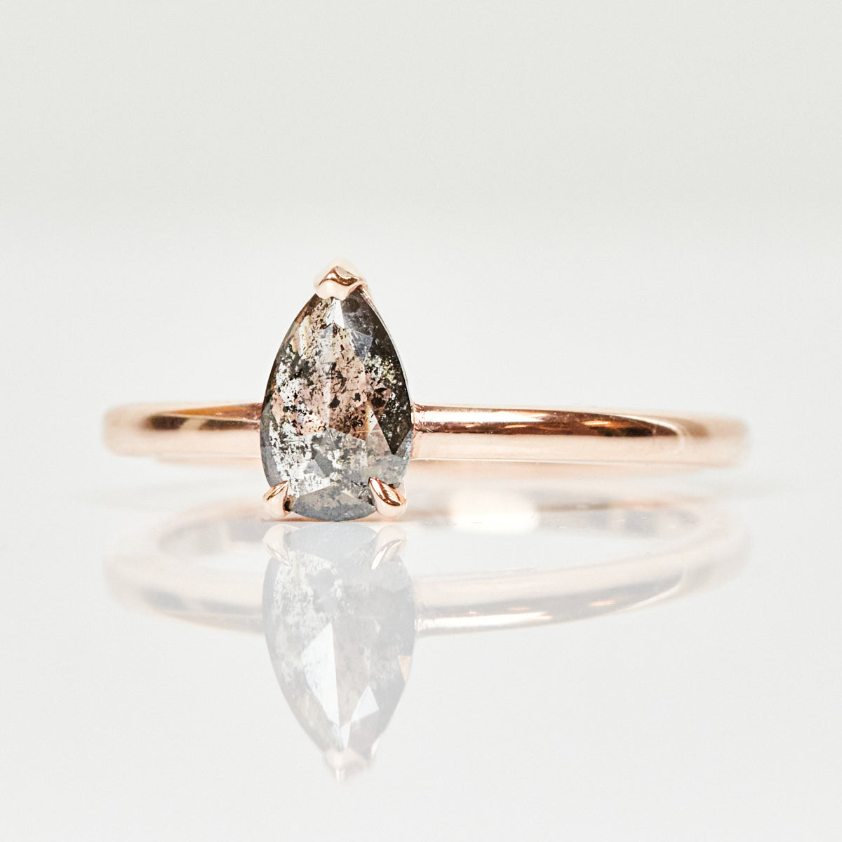 18ct rose gold salt and pepper pear diamond engagement solitaire ring