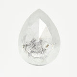 One-of-a-kind pear-shaped rose-cut icy white diamond with unique inclusions.