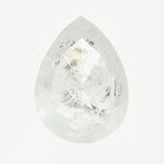 Alternative pear-shaped rose-cut icy white rustic diamond.
