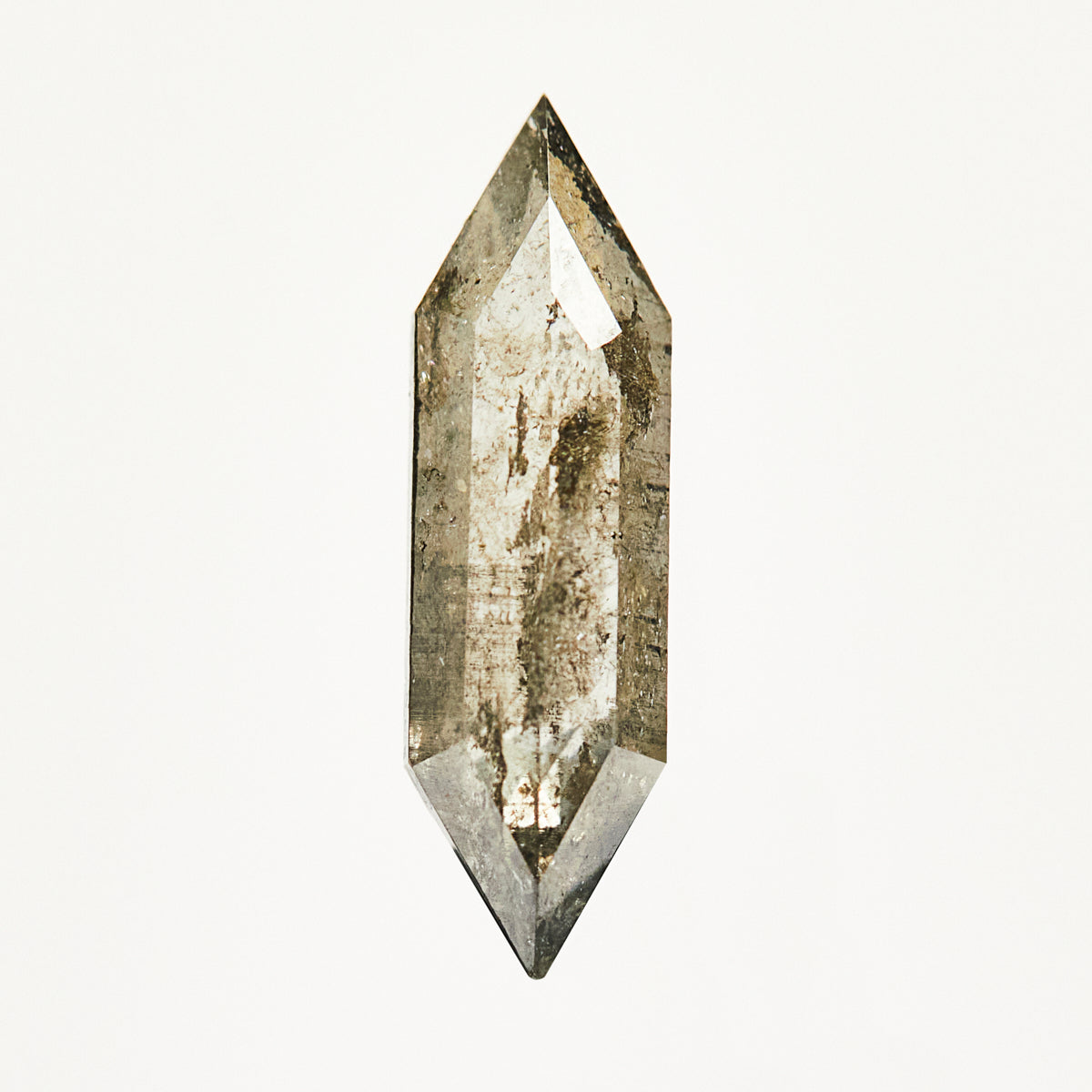 Light grey elongated hexagon rose-cut salt and pepper diamond.