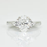 Platinum lab-grown oval diamond trilogy engagement ring