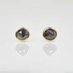 Round rose-cut salt and pepper diamond stud earrings in yellow gold.
