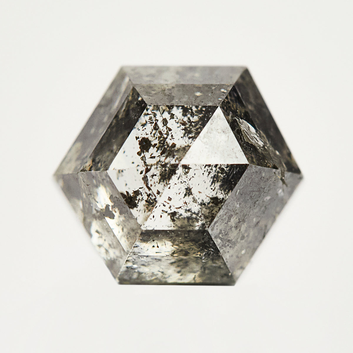 Handcrafted hexagon rose-cut natural salt and pepper diamond.