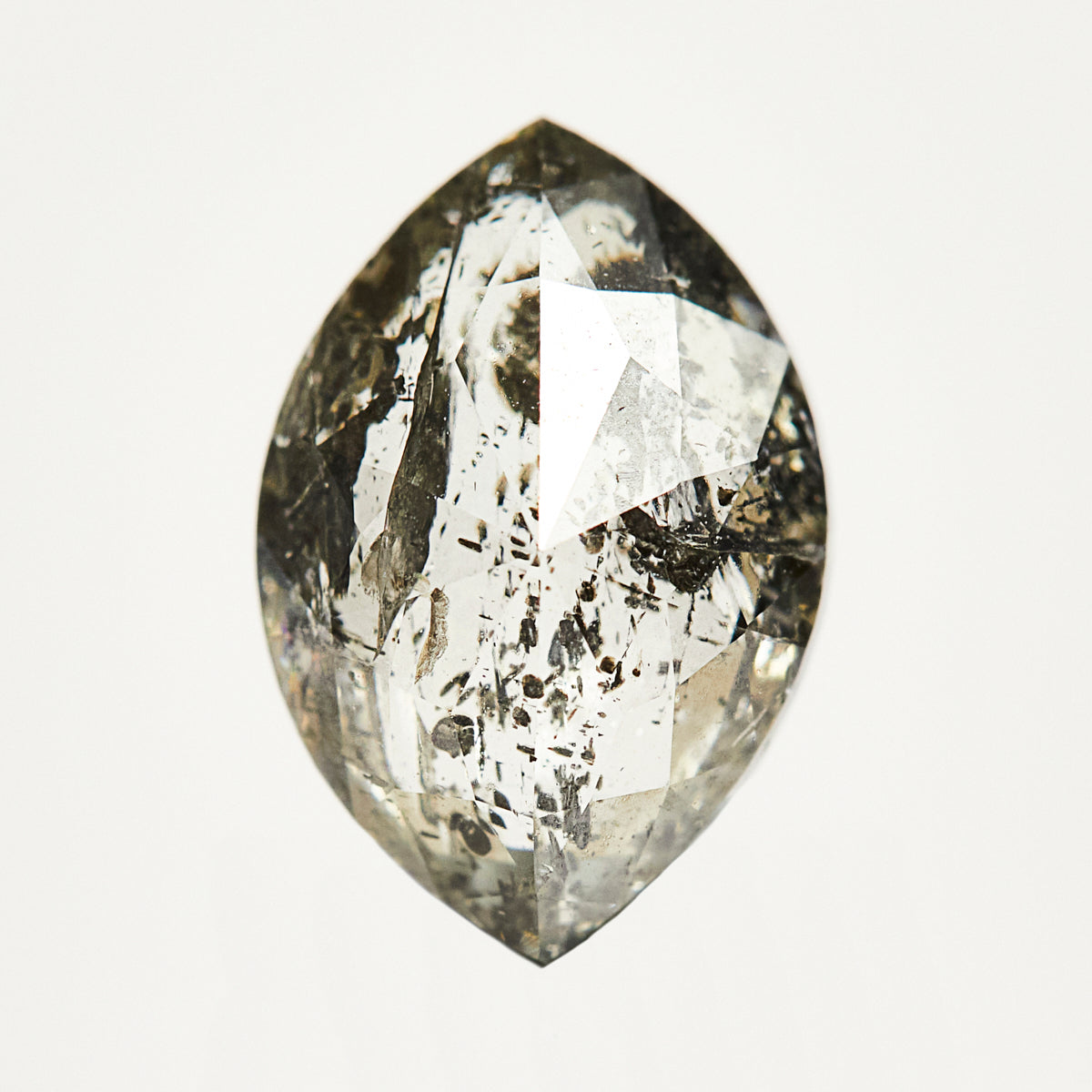 Modern marquise-shaped rose-cut salt and pepper diamond.