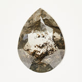 One-of-a-kind pear-shaped rose-cut salt and pepper diamond with unique inclusions.