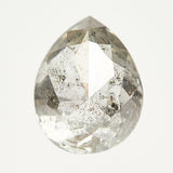 Pear-shaped rose-cut salt and pepper diamond.