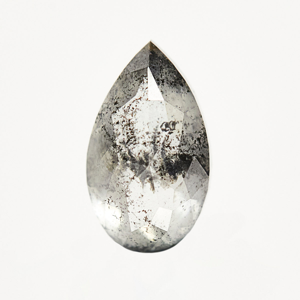 Unique elongated pear-shaped rose-cut loose salt and pepper diamond.