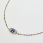Sapphire evil eye bracelet with diamonds in 18ct white gold.