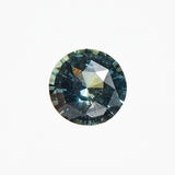 Ethical unheated round brilliant-cut teal sapphire gemstone.