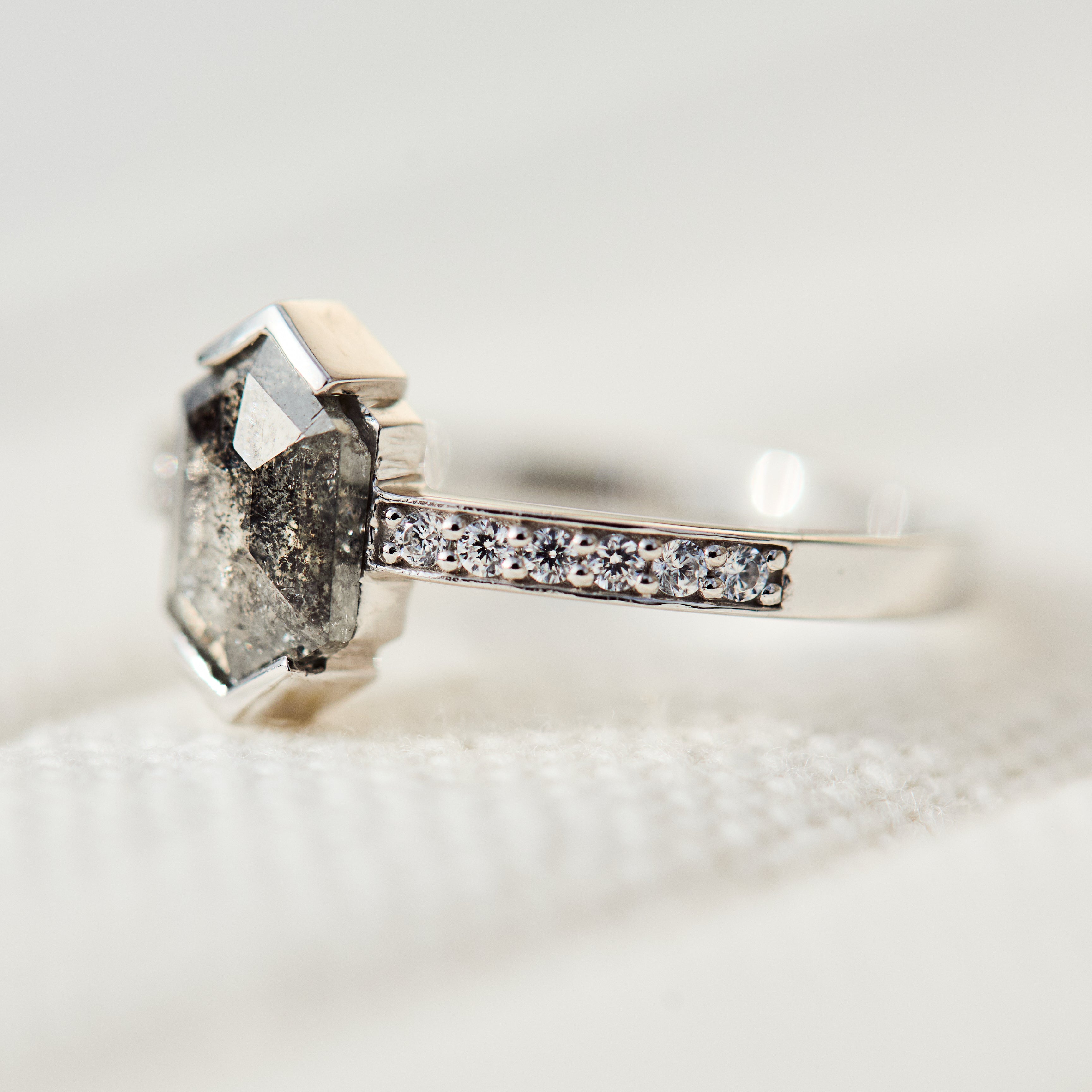 Platinum salt and pepper hexagon diamond engagement pavé ring