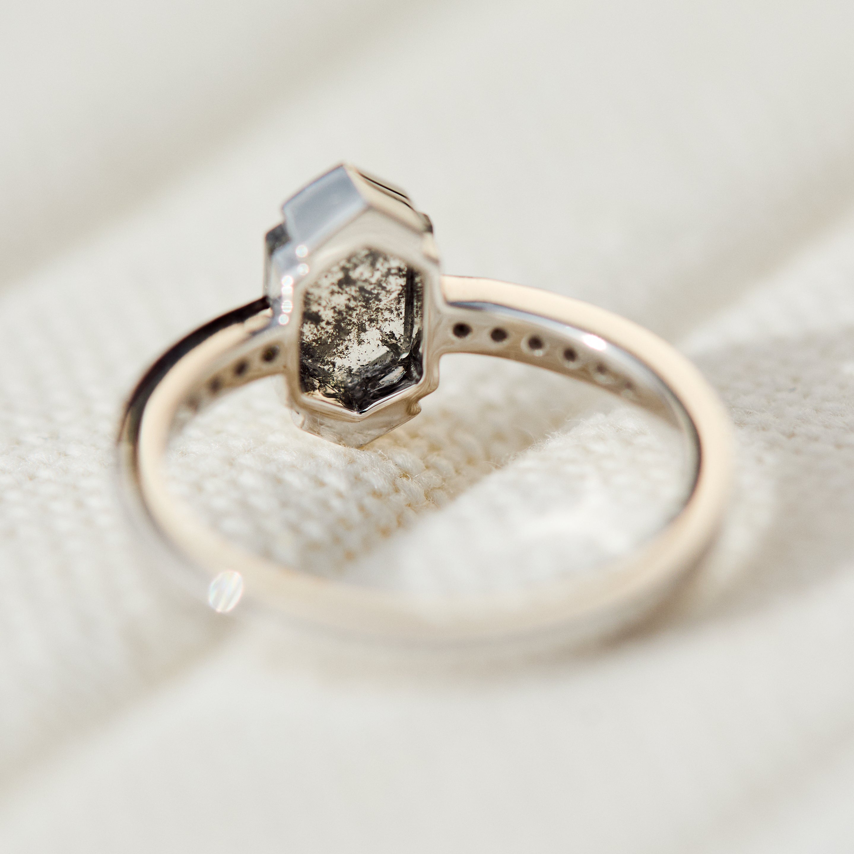 Platinum salt and pepper hexagon diamond engagement pavé ring