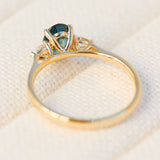 australian oval teal sapphire diamond yellow gold engagement ring