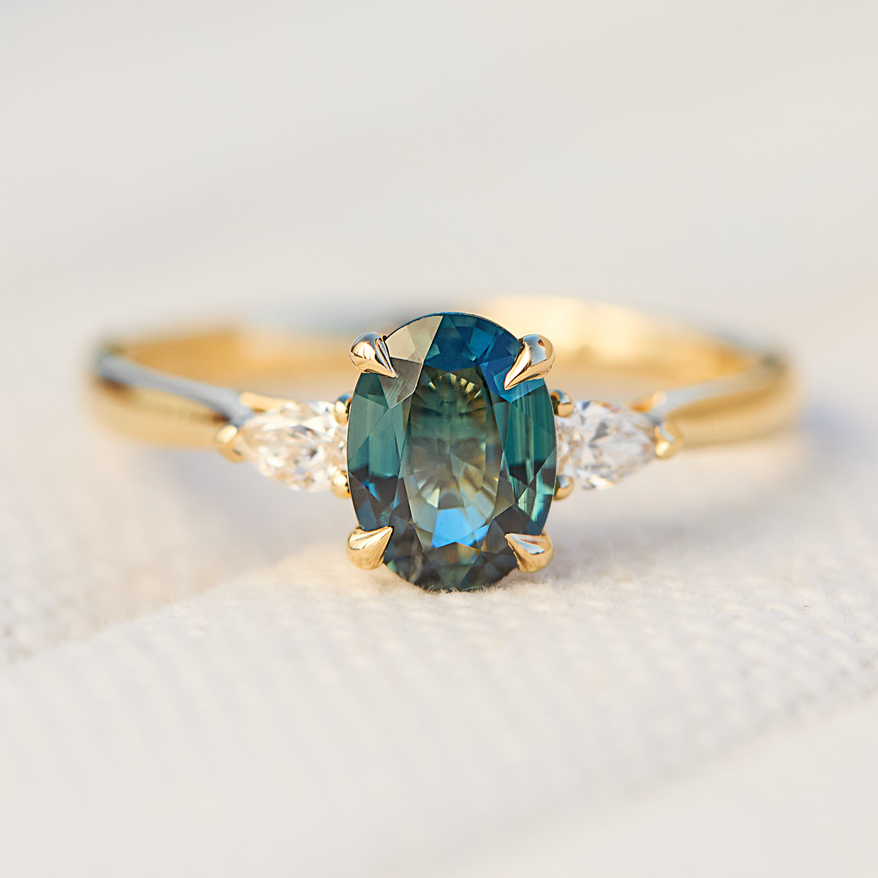 australian oval teal sapphire diamond yellow gold engagement ring