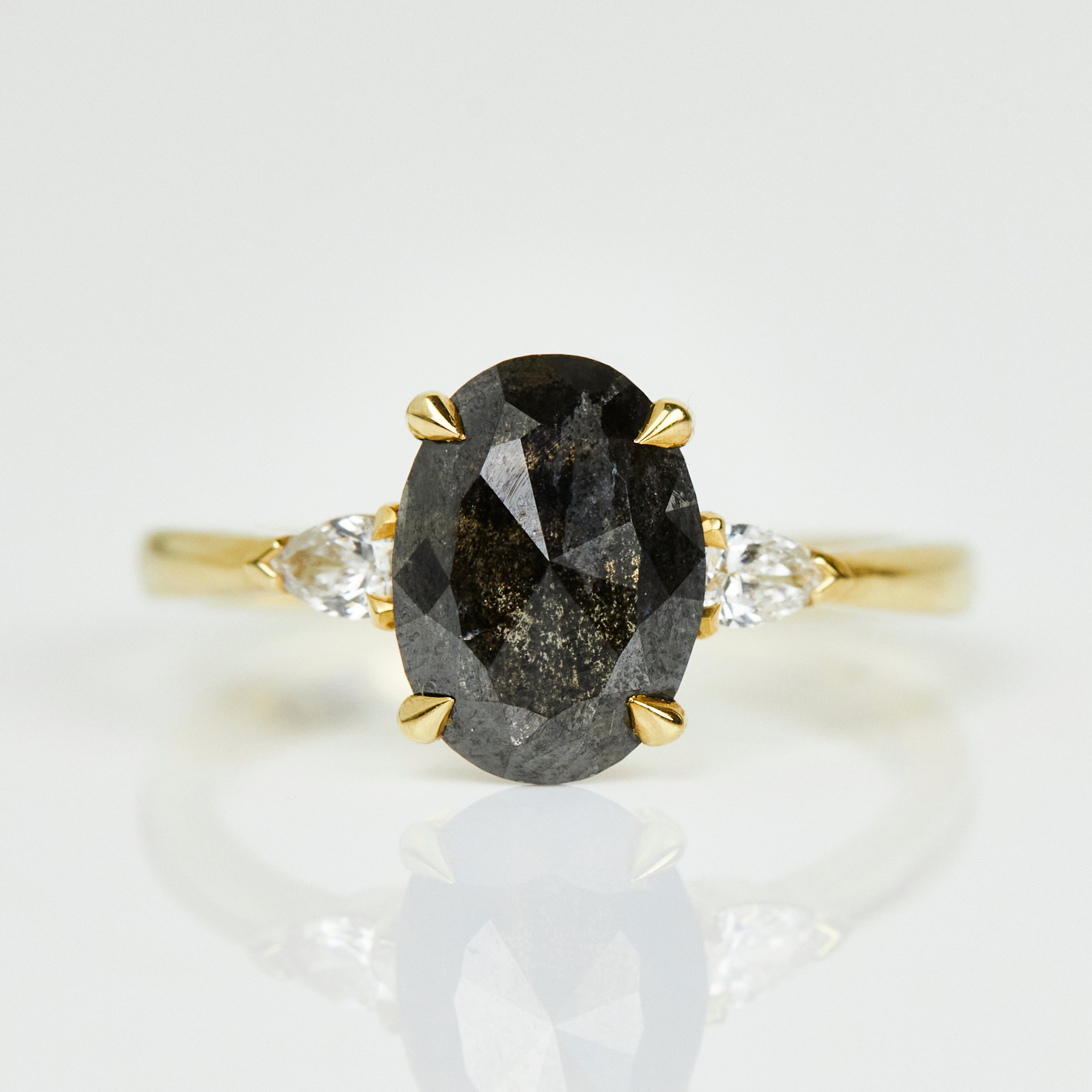 18ct yellow gold salt and pepper oval diamond engagement trilogy ring