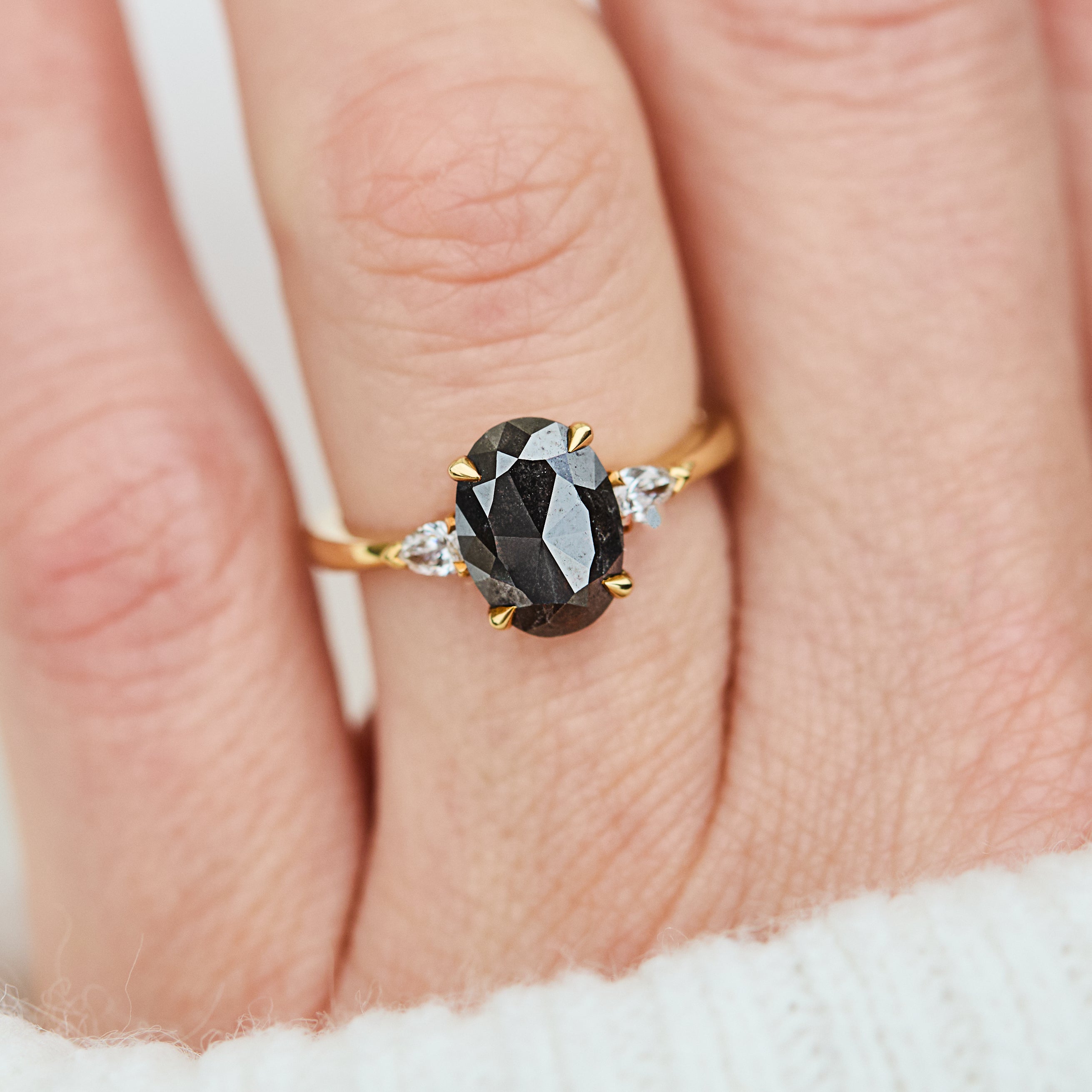 18ct yellow gold salt and pepper oval diamond engagement trilogy ring