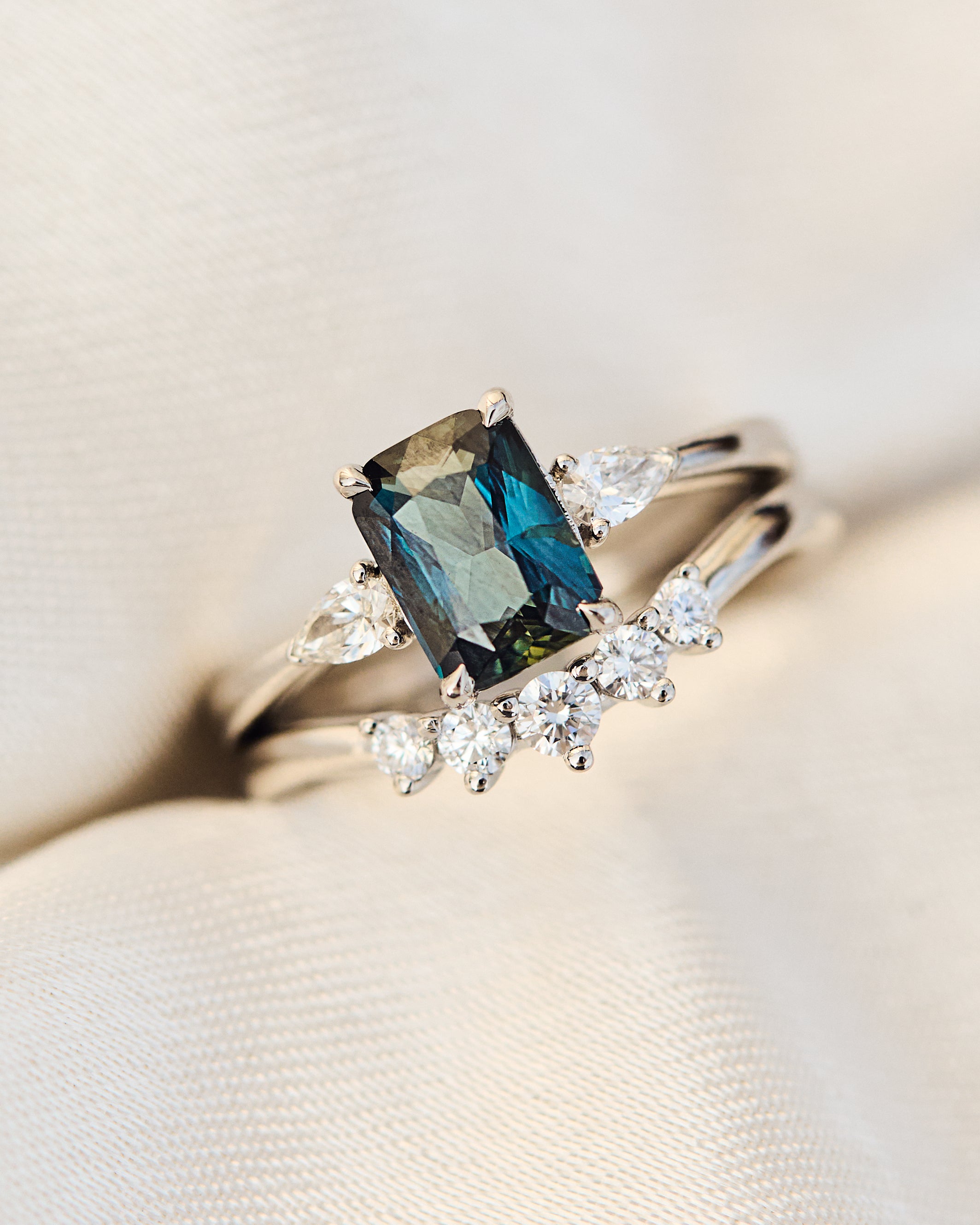 blue teal sapphire and diamond engagement ring stack