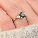 oval blue teal sapphire platinum trilogy engagement ring