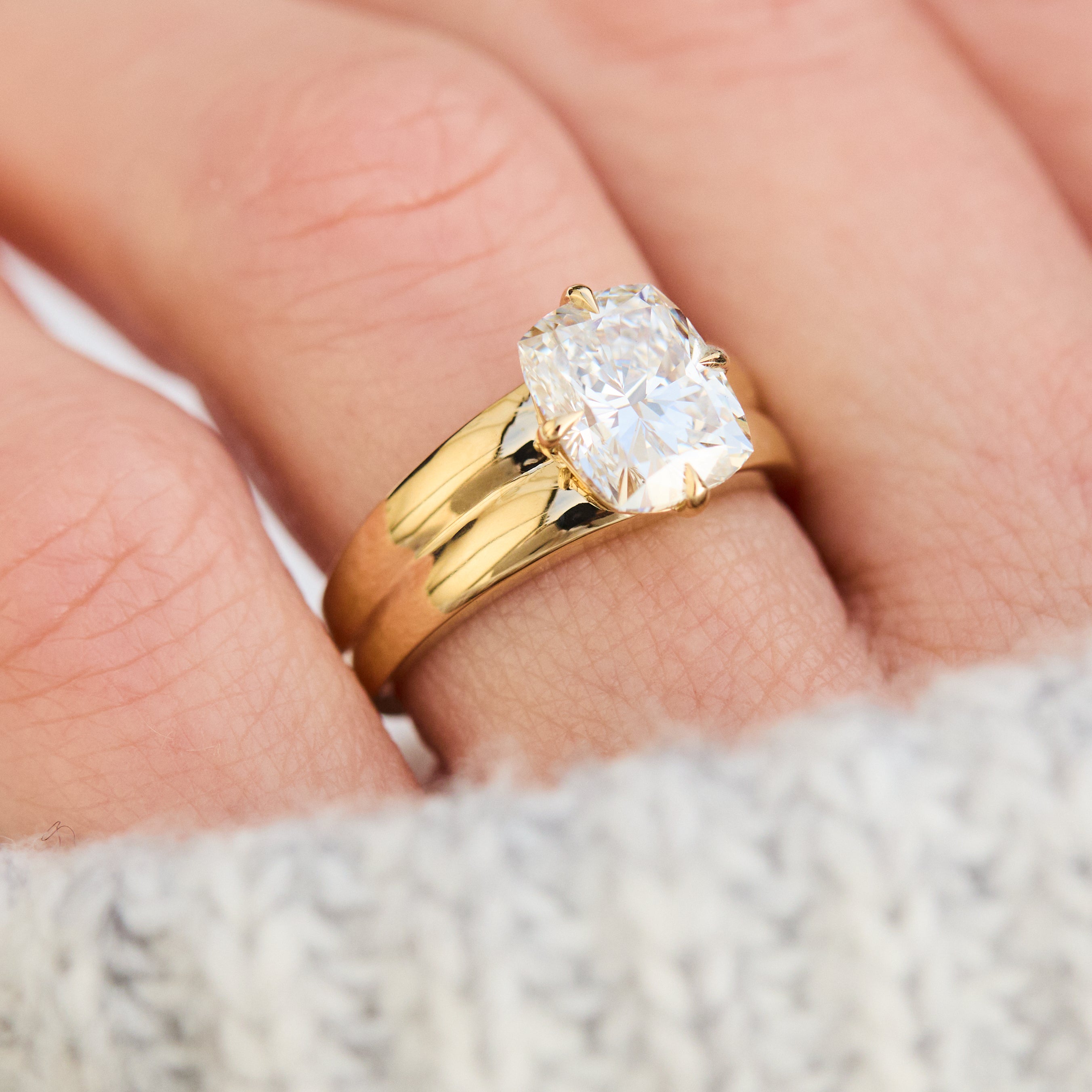 cushion cut lab grown diamond solitaire engagement ring in yellow gold