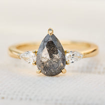 dark and stormy pear shape salt and pepper trilogy diamond ring