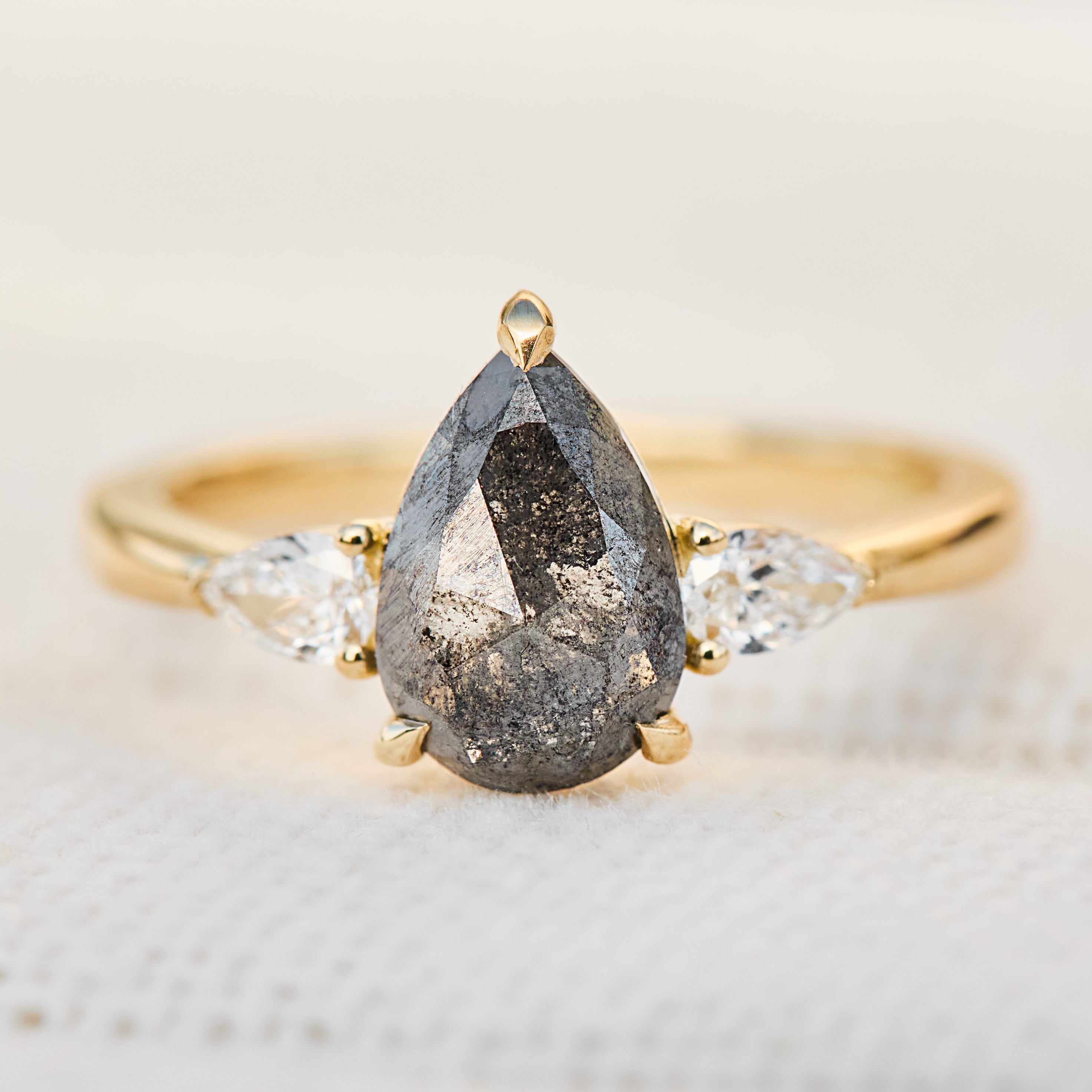 dark and stormy pear shape salt and pepper trilogy diamond ring