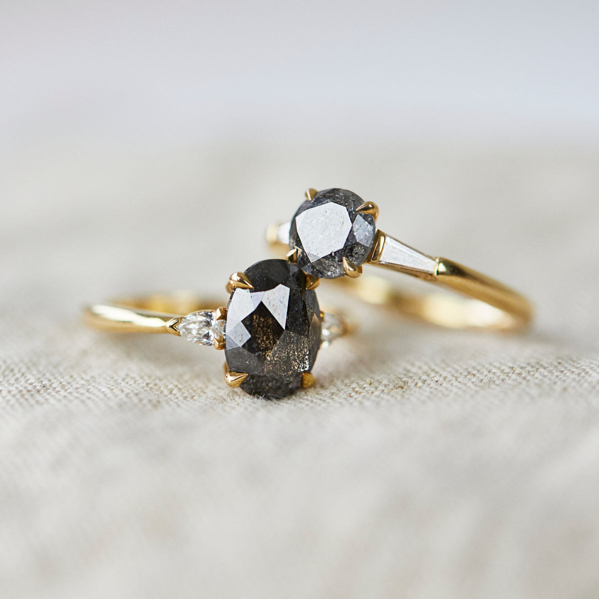 18ct yellow gold salt and pepper oval diamond engagement trilogy ring