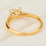 east west oval lab grown diamond engagement ring in yellow gold