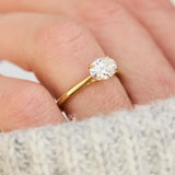 east west oval lab grown diamond engagement ring in yellow gold