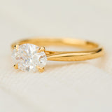 east west oval lab grown diamond engagement ring in yellow gold