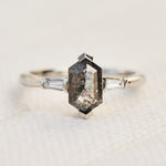 elongated hexagon salt and pepper diamond trilogy engagement ring