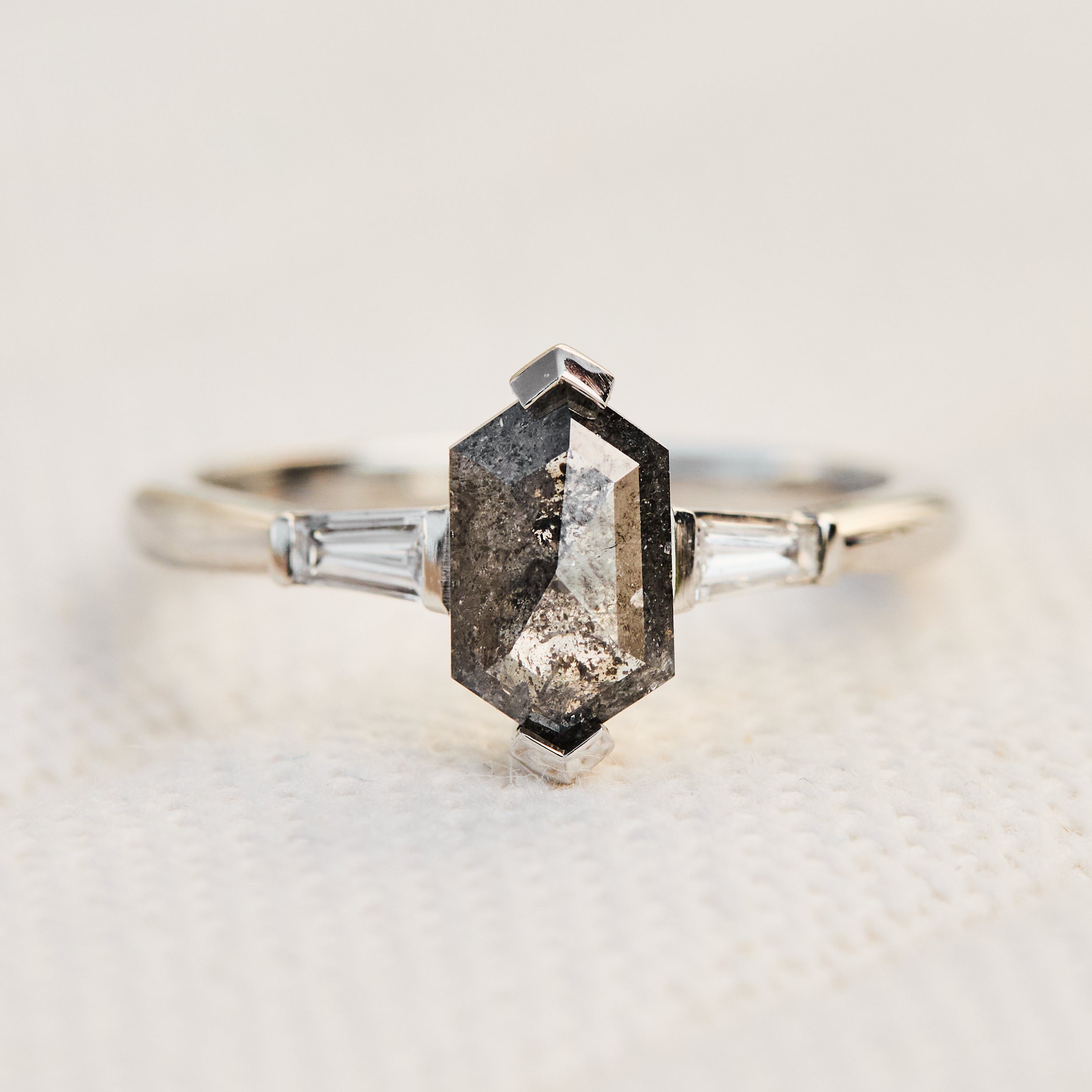 elongated hexagon salt and pepper diamond trilogy engagement ring