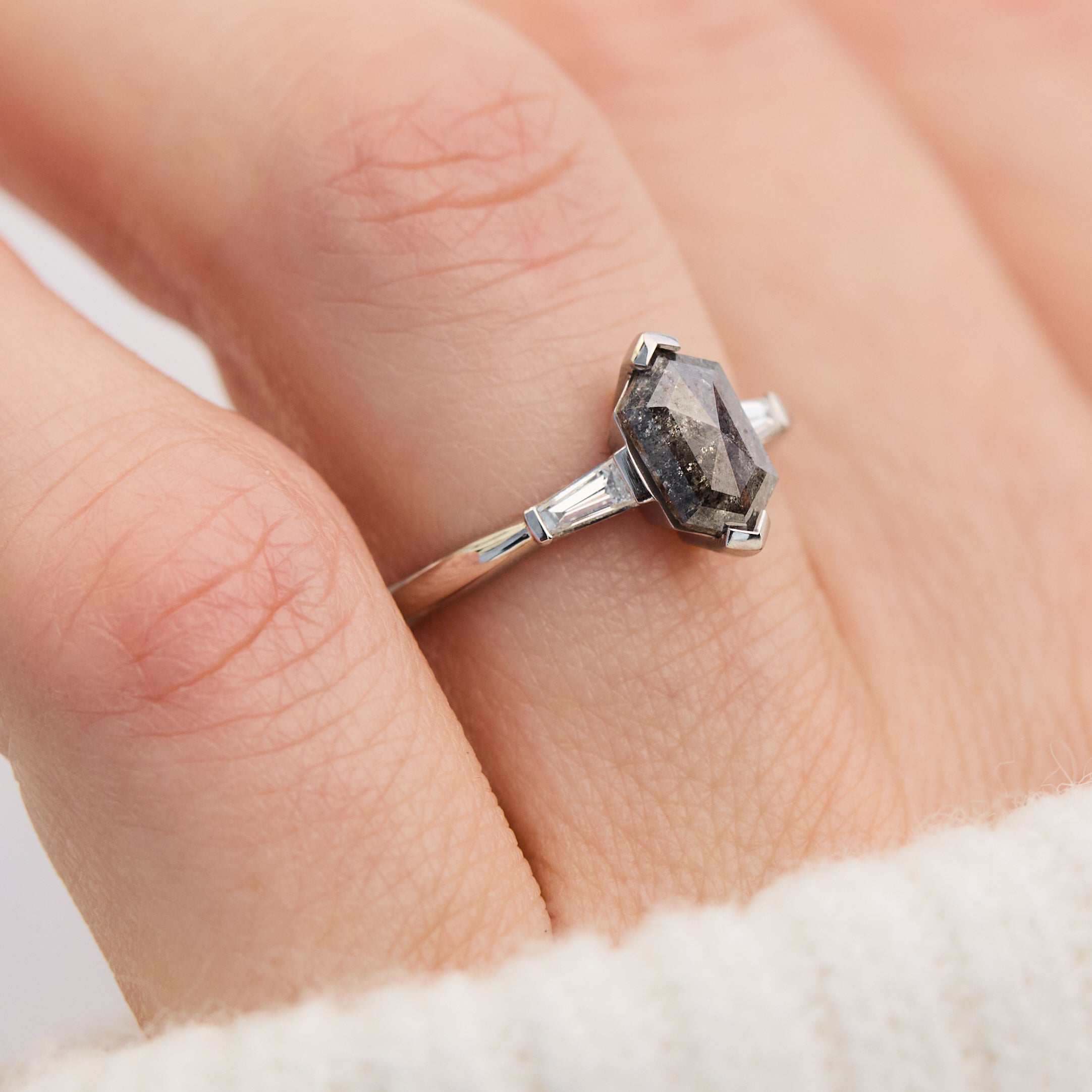 elongated hexagon salt and pepper diamond trilogy engagement ring