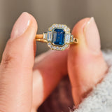 emerald cut blue sapphire one of a kind engagement ring in yellow gold