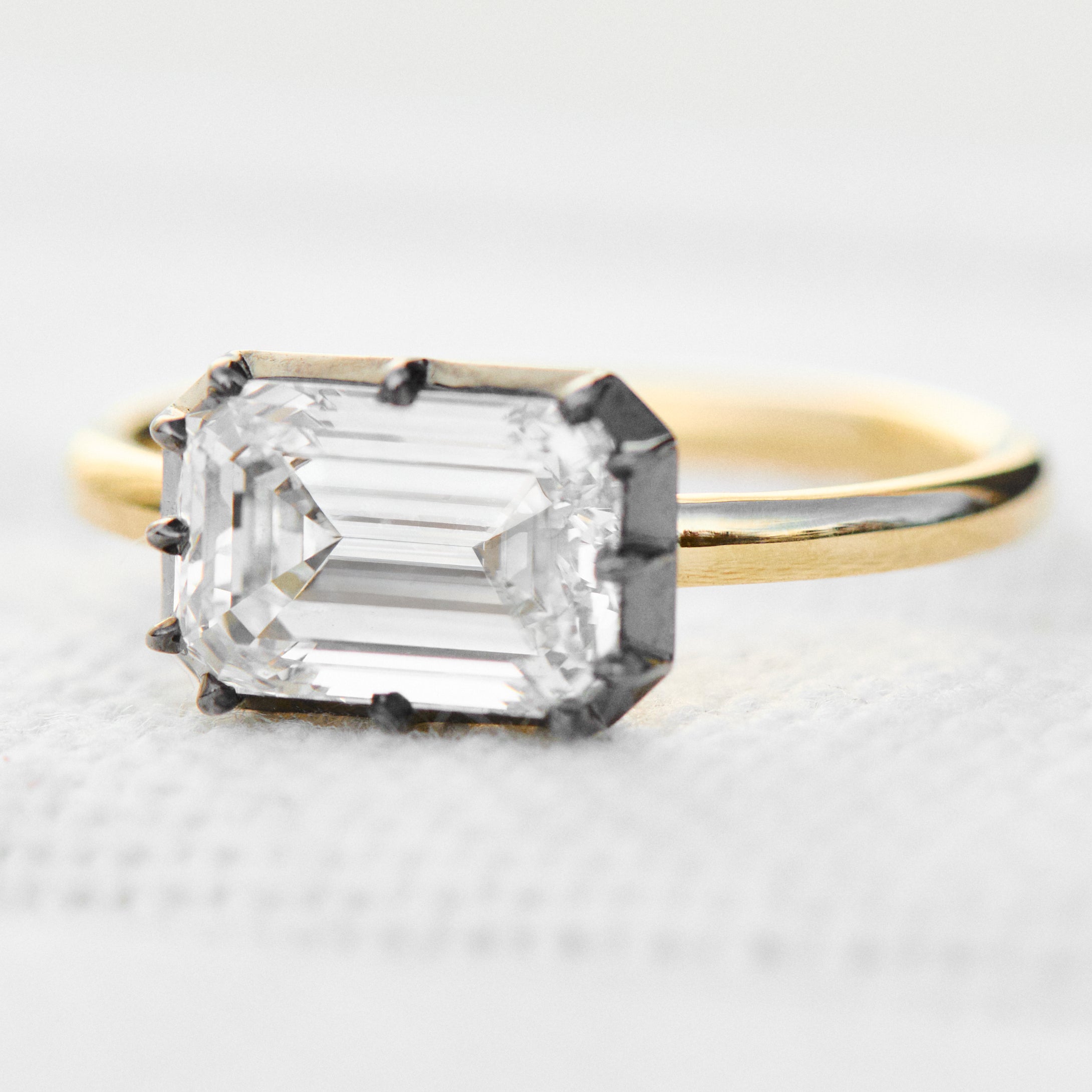 emerald cut lab grown diamond engagement ring east west setting