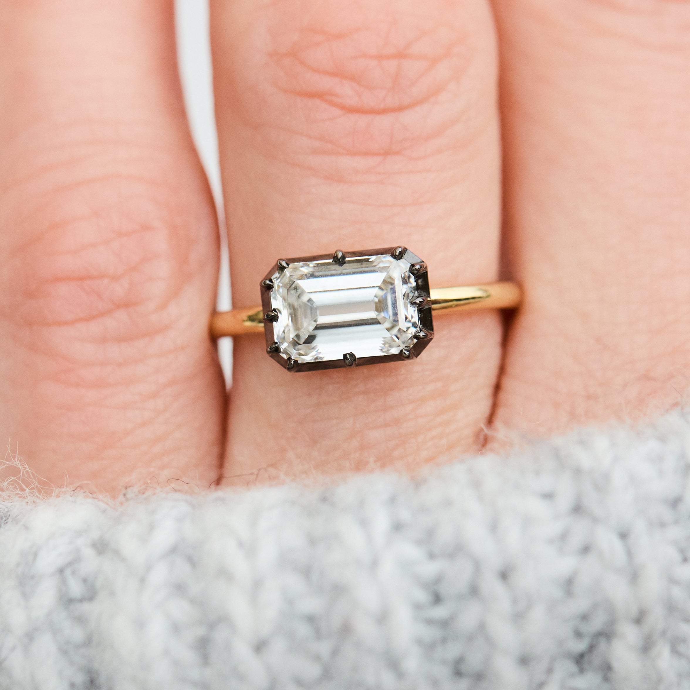 emerald cut lab grown diamond engagement ring east west setting