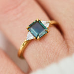 18ct yellow gold emerald cut trilogy ​teal sapphire rings