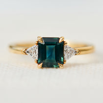 emerald cut teal sapphire ring