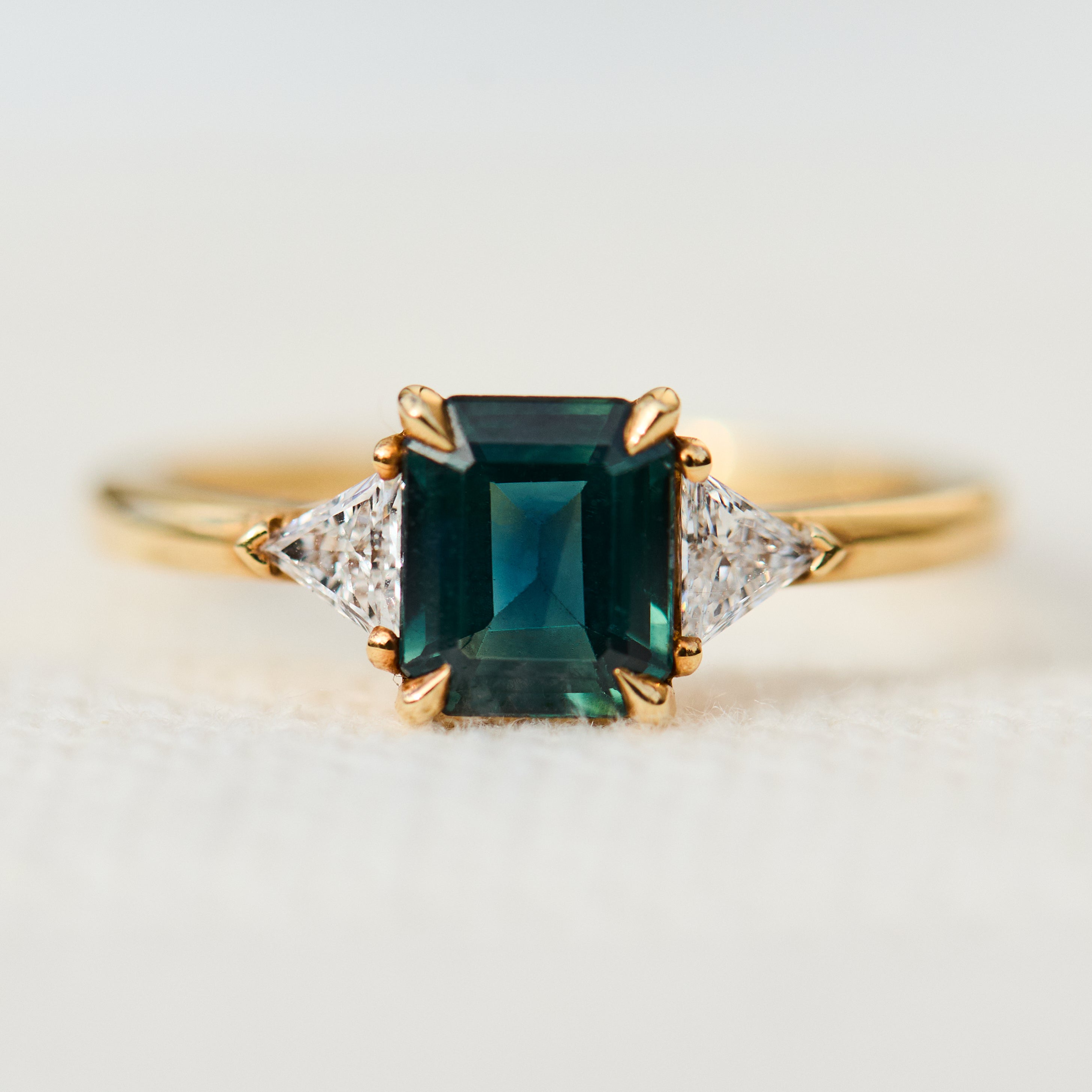 emerald cut teal sapphire ring