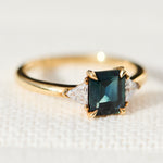 emerald cut teal sapphire ring