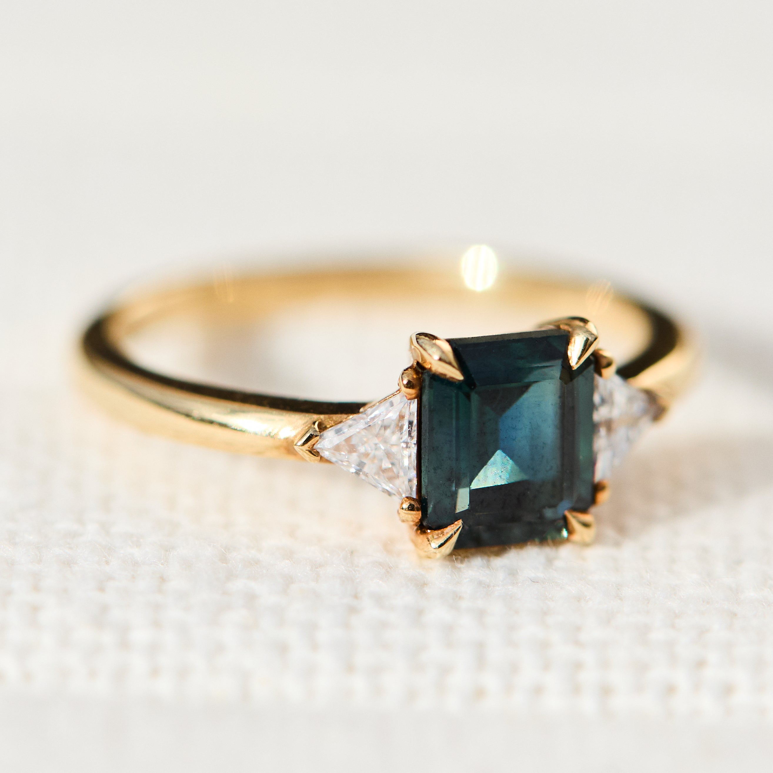 emerald cut teal sapphire ring