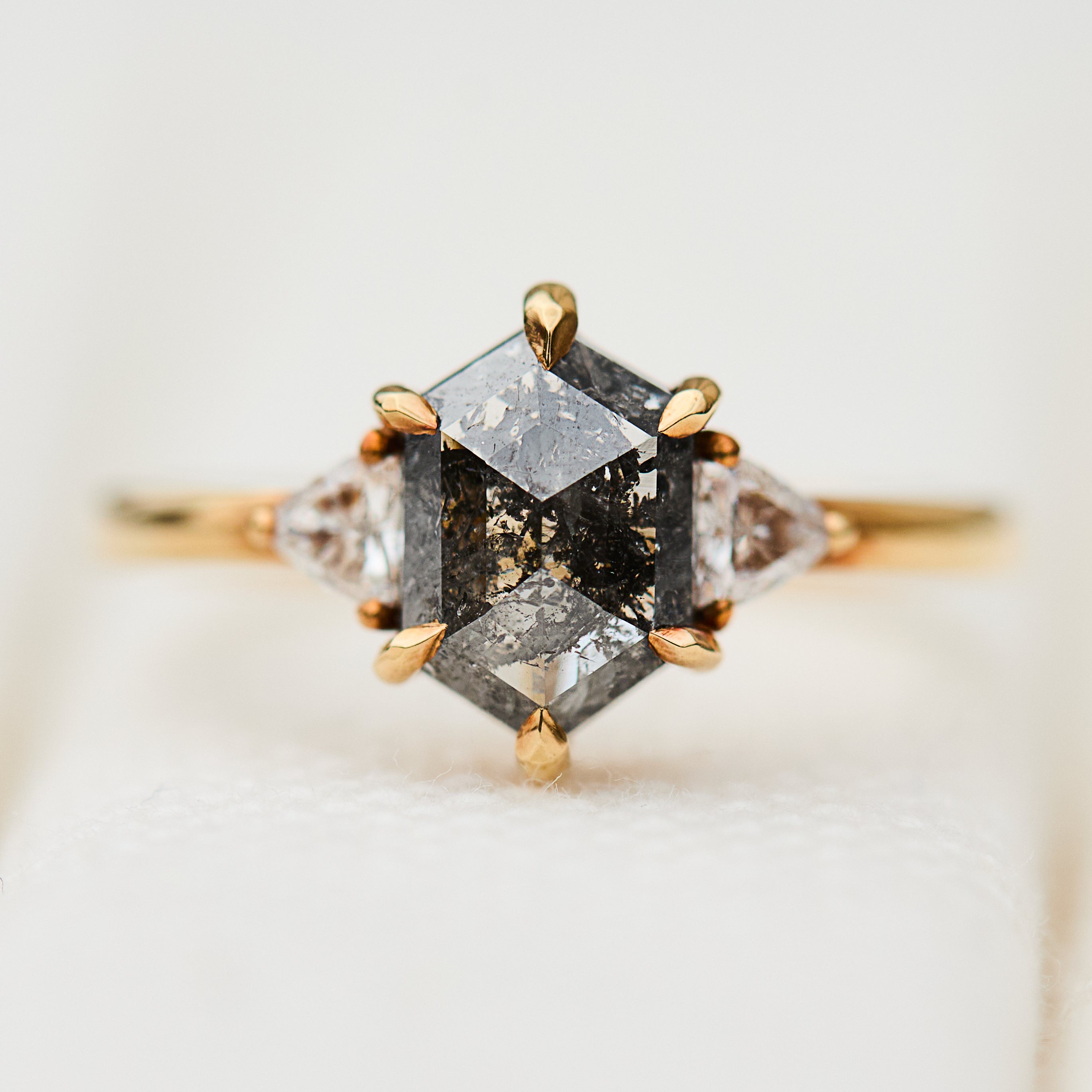 hexagon dark grey salt and pepper diamond trilogy engagement ring