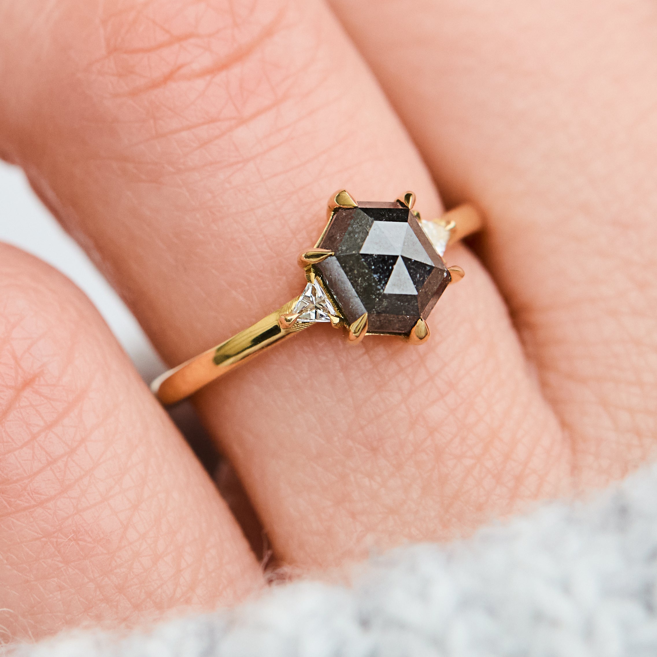 hexagon salt and pepper diamond trilogy engagement ring in yellow gold