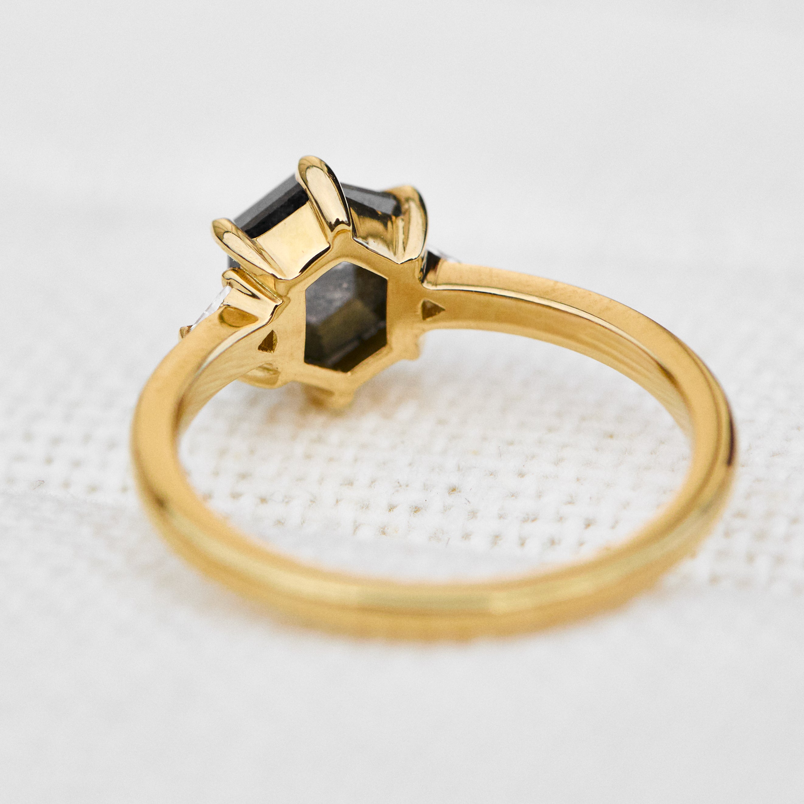 hexagon salt and pepper diamond trilogy engagement ring in yellow gold